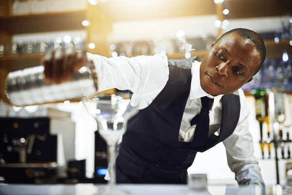 black man bartender prepare alcohol 600nw 2459426931